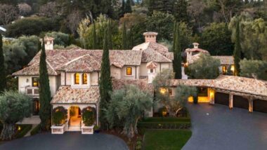 Luxury estate in one of the richest small towns in America surrounded by tall trees and private grounds