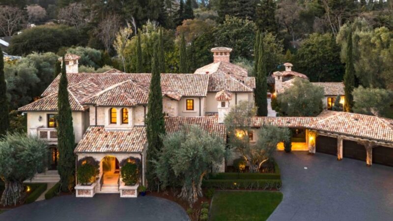 Luxury estate in one of the richest small towns in America surrounded by tall trees and private grounds
