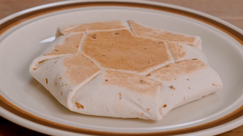 Crunchwrap Supreme served on a plate