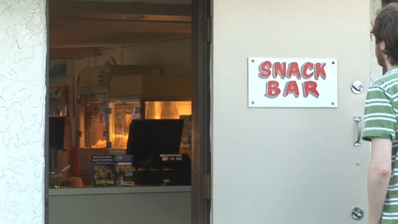 Snack bar entrance at Shankweiler Drive-In with popcorn visible inside